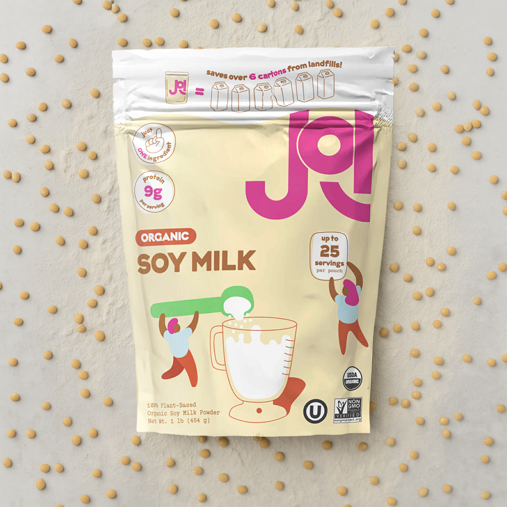 JOI Organic Soy Milk package on a light gray background with scattered soybeans.